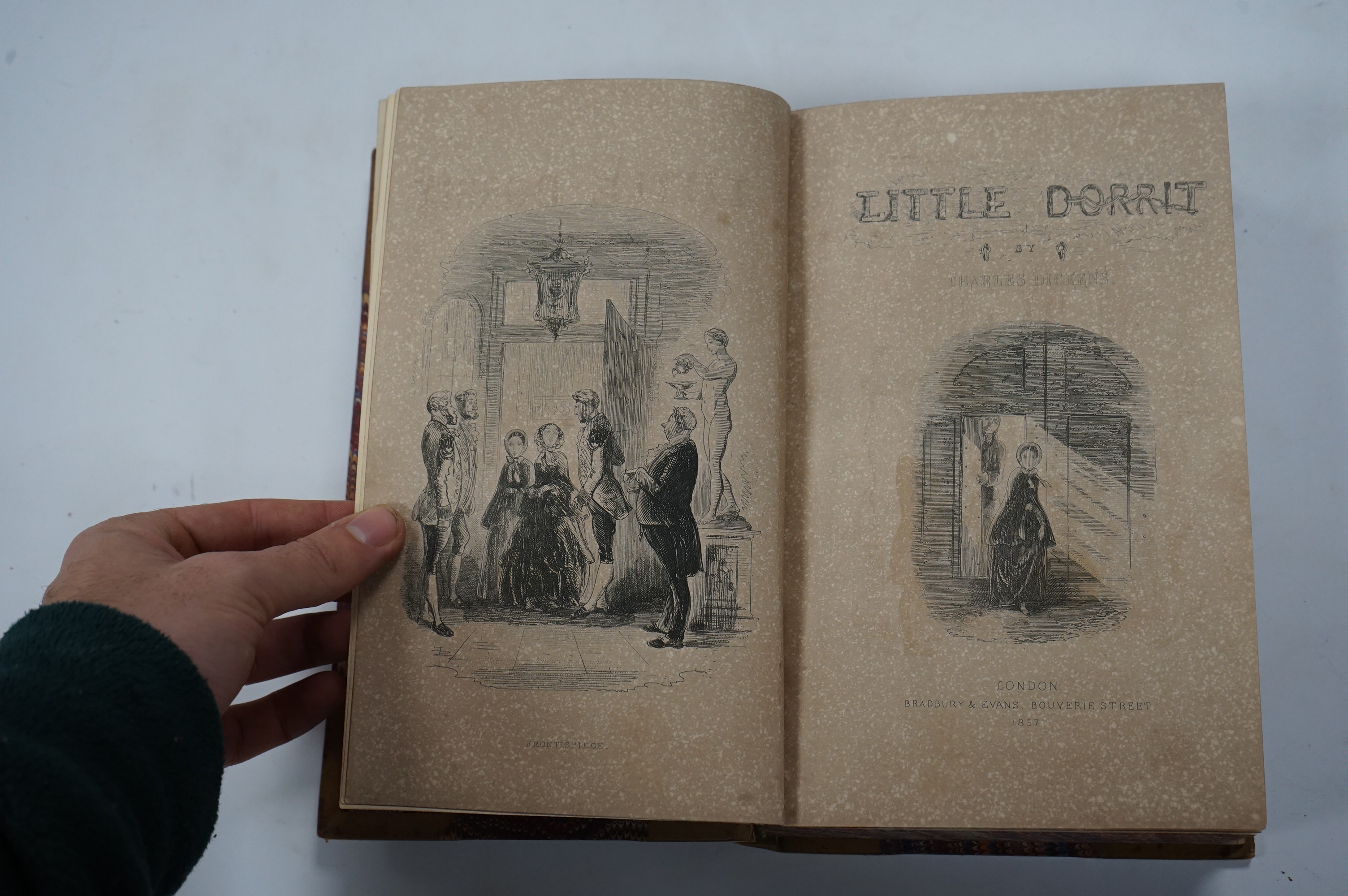 Dickens, Charles - The Mystery of Edwin Drood. First Edition. portrait (of the author), pictorial engraved and printed titles, and 12 plates (by S.L. Fildes); old calf and marbled boards, gilt decorated panelled spine wi